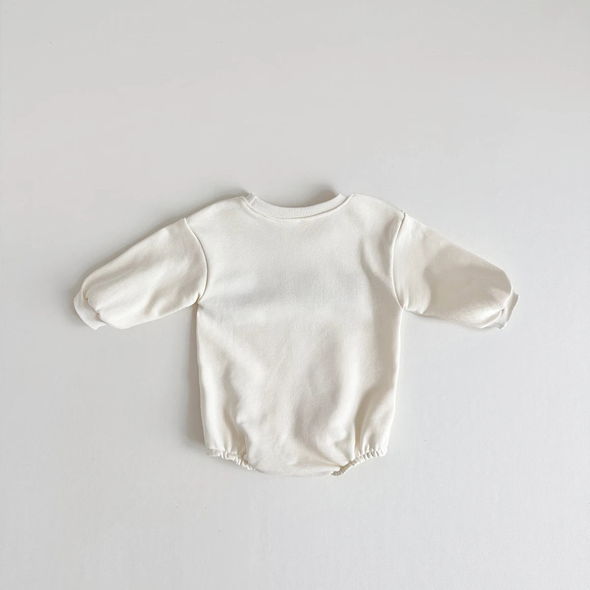 Baby Strampler in grau
