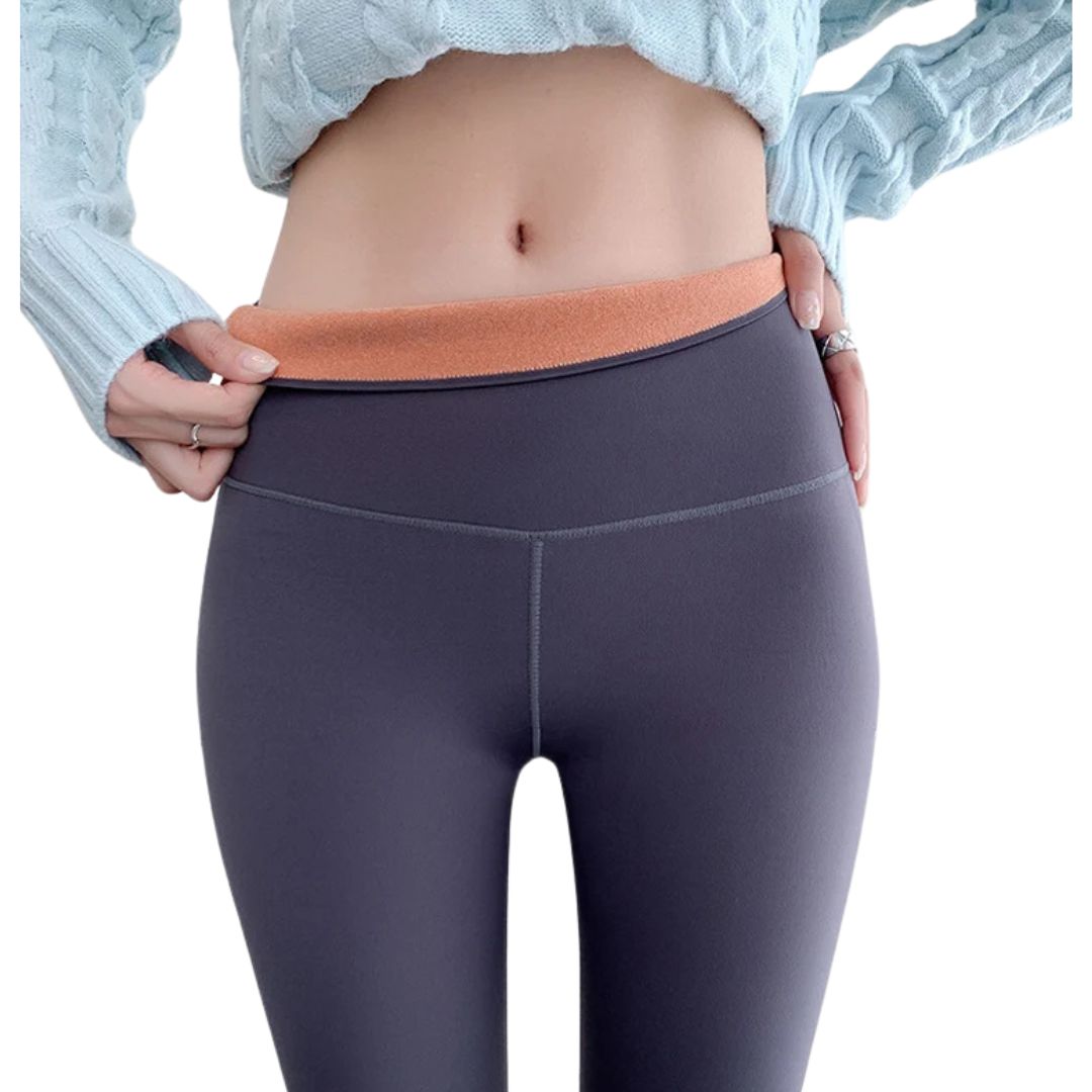 Graue Thermo Leggings mit orangefarbenem Fleece-Futter und hohem Bund, perfekt für kalte Tage. Ideal für Mamas bei Kiddoskiste erhältlich.