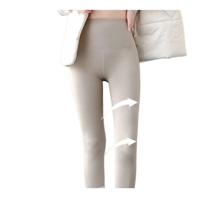 Beige Thermo Leggings mit figurformendem Effekt und elastischem Stoff. Warme Winterleggings für Damen bei Kiddoskiste.